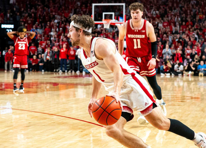 Feb 1, 2024; Lincoln, Nebraska, USA; Nebraska Cornhuskers guard Sam Hoiberg (1) gets a loose ball against the Nebraska Cornhuskers during overtime at Pinnacle Bank Arena.